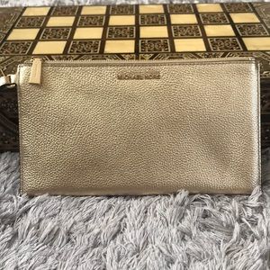 Michael Kors gold wristlet